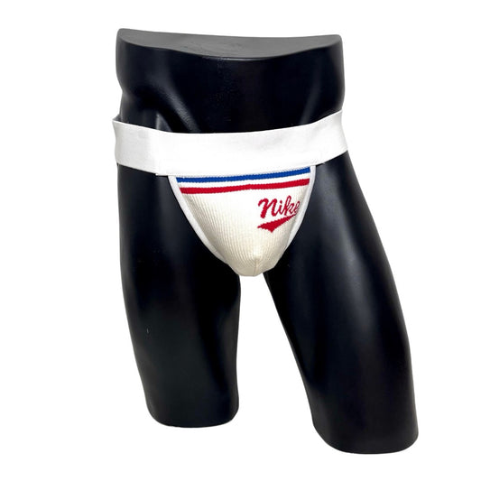 A jockstrap made from up-cycled Nike socks, predominantly white with red and blue accents and Nike logo branding.
